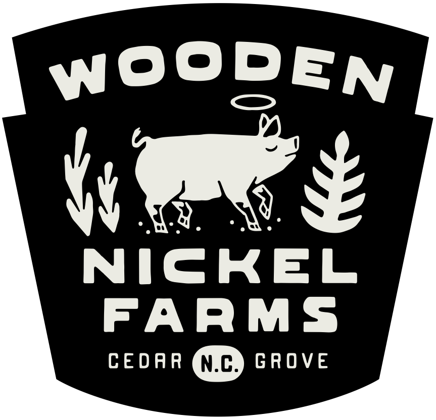 Wooden Nickel Farms logo